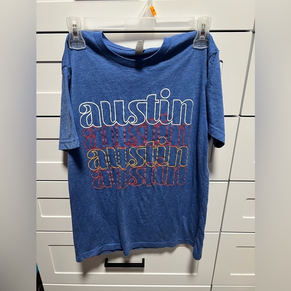 Austin (Texas) T-shirt blue with white, red, an orange lettering